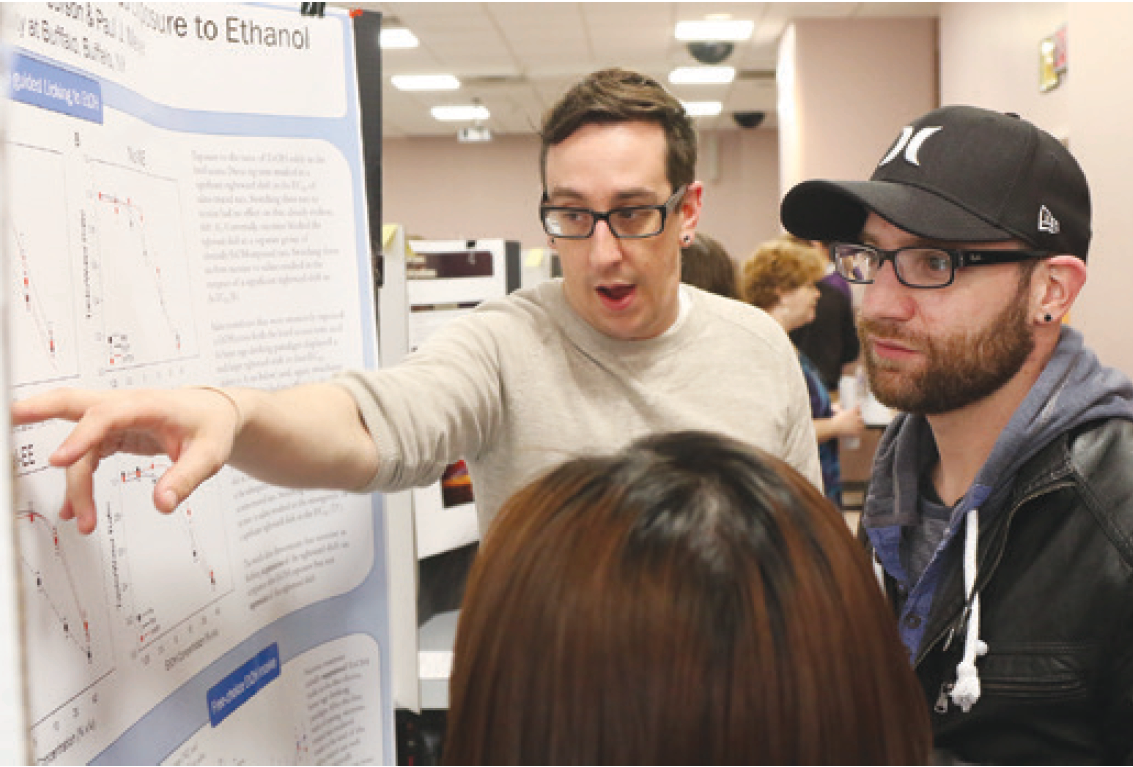 Greg and Chris at poster